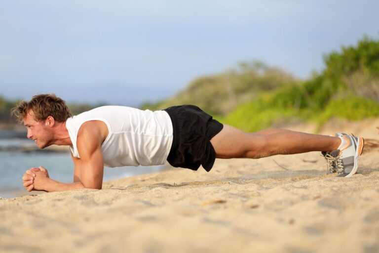 Man doing plank core strength exercise