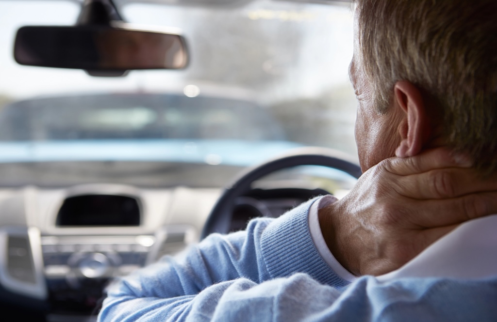 Man in pain from whiplash