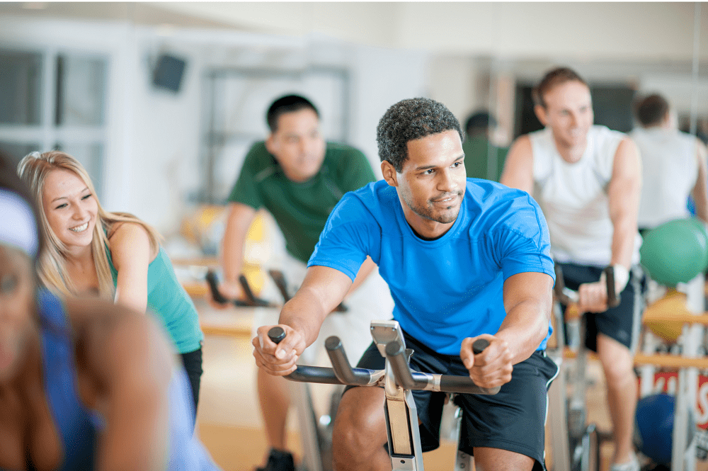 People At An Exercise Spinning Class