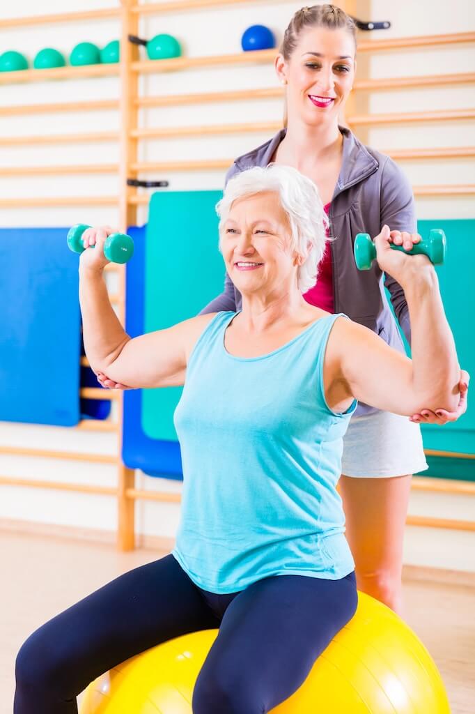 Senior woman doing physical therapy excercise
